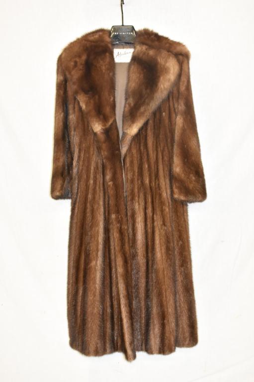 Alaskan Built Fur Lunaraine Mink Coat & Sable Coat: Mink coat with sable trim. .Approximate size small / 8, 48" long. Satin lining with butterfly embroidery. Coat has always been professionally stored. Very good condition. Original purchase price $9000
