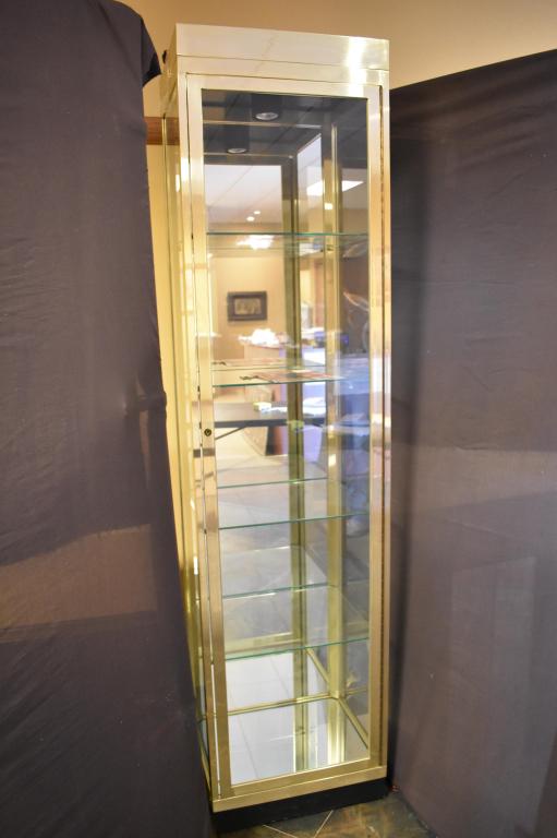 Tall Mirrored and Glass Lighted Display case: Metal frame with 4 glass shelves and mirror back. Doors lock. 80 1/2" x 20" x 16". Local pickup or outsourced shipping.