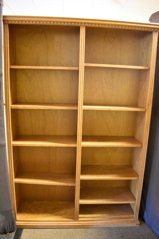 Oak Bookcase: Ten adjustable shelves 72" 47 1/2' wide 12" deep. Veneer panels with solid oak hardwood trim. Dental molding at top. Local pick up or outsourced shipping.