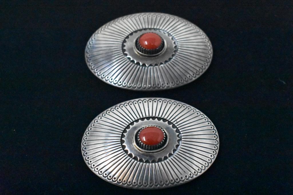 2 Al Nez Sterling and Coral Concho Belt Medallions: Appears to be coral. Marked “Sterling”, ”Al Nez” . 3” x 2”.