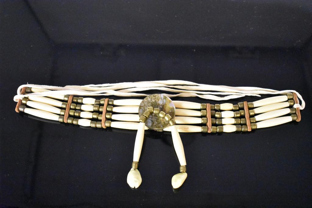 Handmade Cowrie Shells, Abalone & Leather Choker: Medallion shield is abalone with bone tubes hanging from it ending in cowrie shells. Choker is 11 3/4” not counting leather ties.