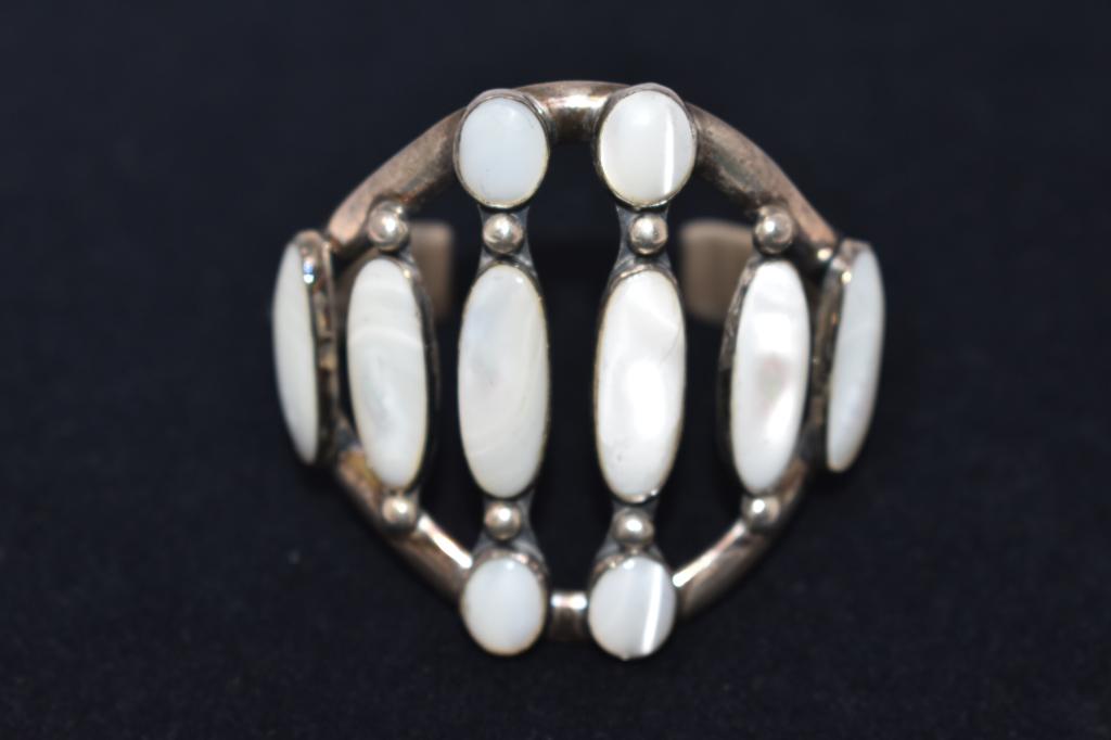 White Stone L Jaeger Bracelet: Possibly white abalone and sterling. Signed L Jaeger '79.