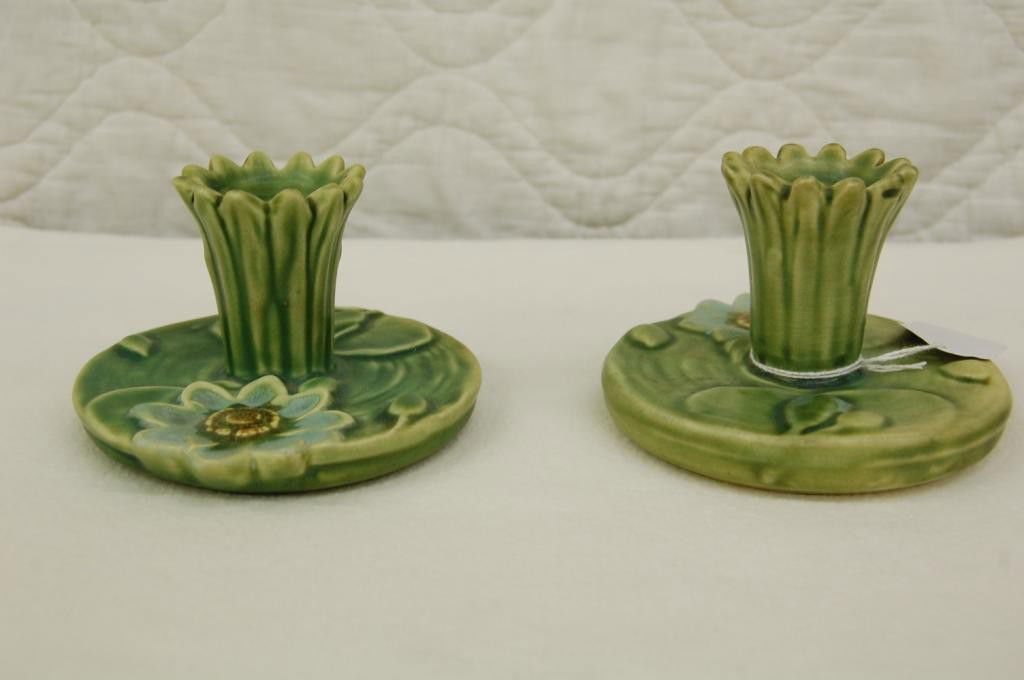 WELLER WARE ARDSLEY CANDLE STICKS: MARKED WELLER WARE. LILLY PAD MOTIF. 2 3/4 INCHES TALL. GOOD CONDITION.