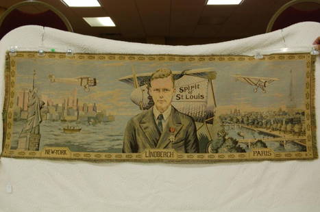 VINTAGE LINBERG FRENCH TAPESTRY: 2 SCENCES. FIRST IS NEW YORK WITH STATUE OF LIBERTY & SPIRIT OF ST LOUIS PLANE. SECOND SCENES IS OF PARIS WITH THE SPIRT OF ST LOUIS PLANE. LINBERG IS IN THE MIDDLE DIVIDING THE TWO. MARKED MADE IN FR