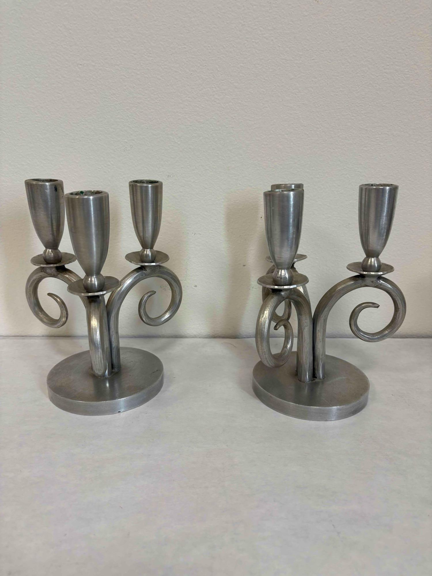 Palmer Smith Hammered Aluminum Set of Candelabra: 2x Three Pillar Candelabra #100B - 7 inches tall x 5&1/2 inches wide. 4 inch base diameter All Palmer-Smith aluminum ware was made before the outbreak of WWII. As with the entire aluminum gif