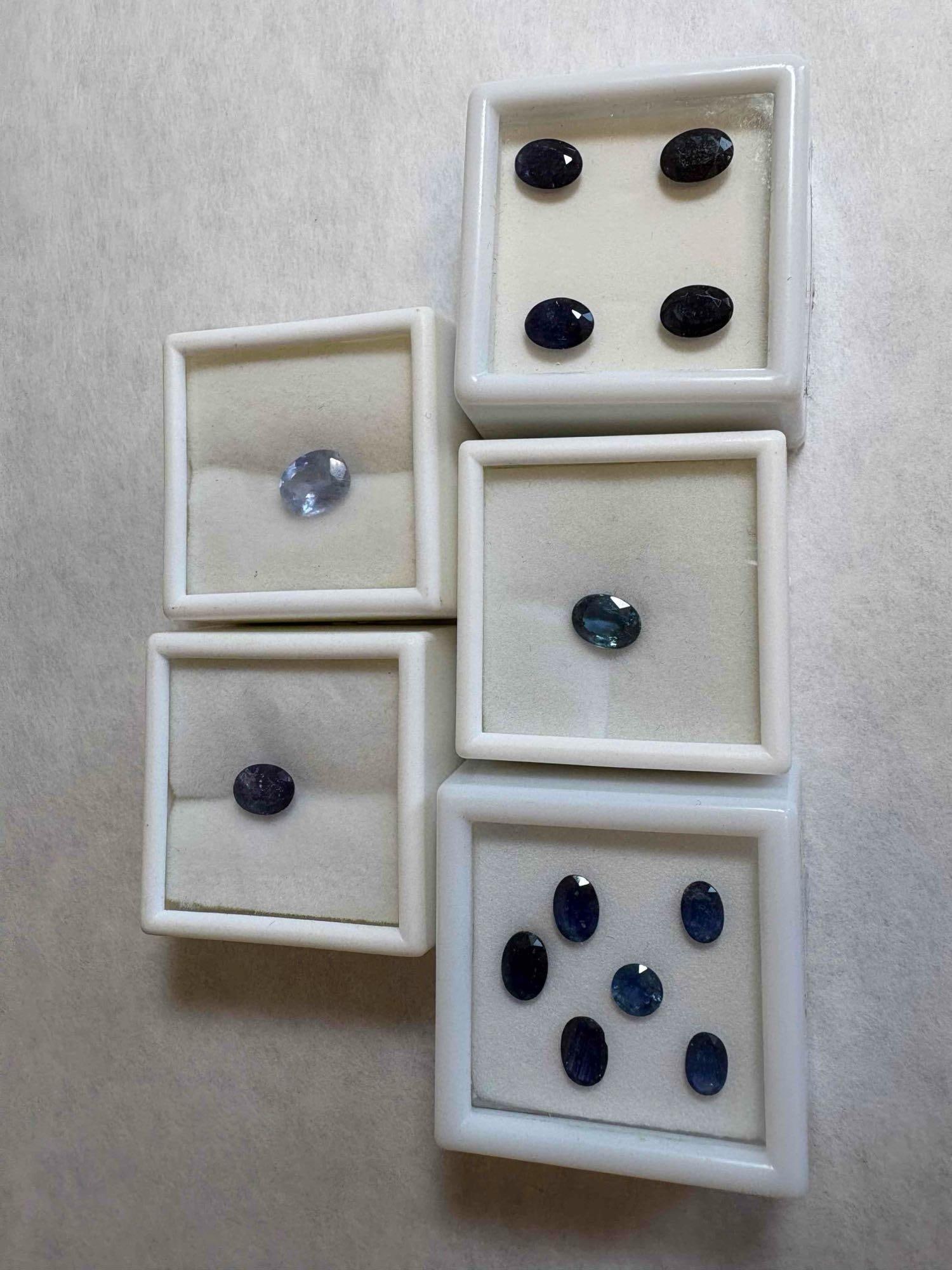 Loose Blue Sapphire: Loose Blue Sapphire: Set of Four 2.8CT 8x6mm Oval Cut, 2.84CT 9x8mm Natural Oval Cut,1.5CT 8x6mm Natural Oval Cut, 1.4CT 8x6mm Oval Cut, & Six Assorted Oval and Round Cut