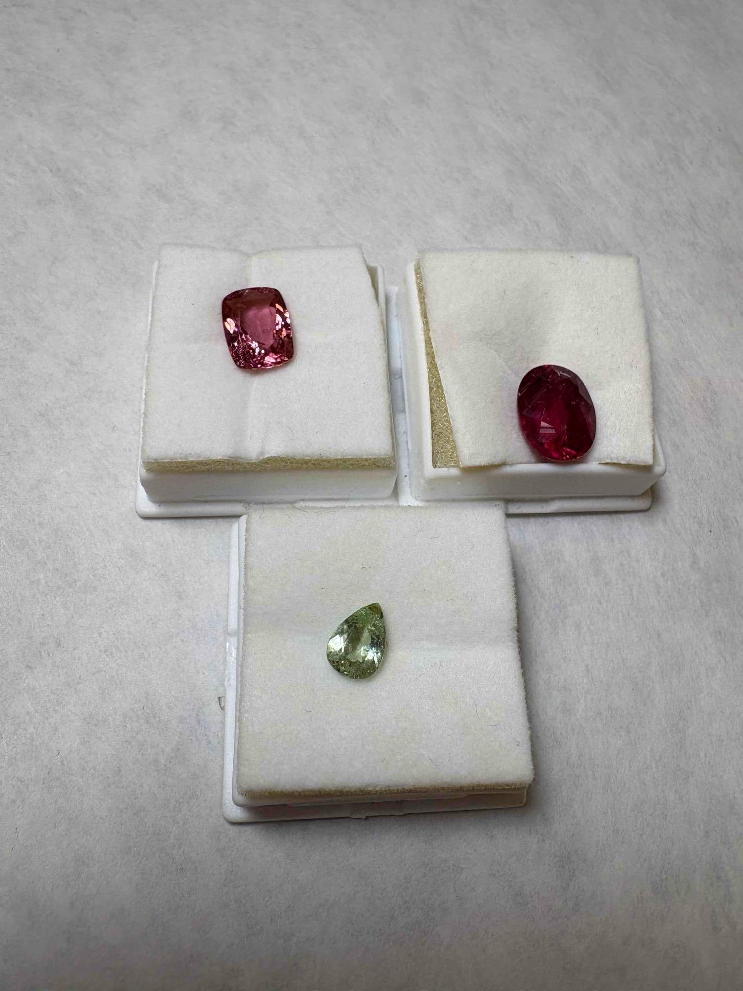 3 Loose Tourmaline: 1.15CT Cuprian Green Tourmaline Pear Cut, 8.33CT 14x11mm Rubellite Tourmaline Oval Cut, & 4CT Pink Cuprian Tourmaline Cushion