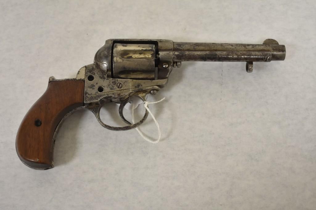 Gun. Colt Model 1877 .38 Revolver. Antique: 6-shot SA revolver. 1878 Manufacture. Very little finish remaining. Heavy pitting. Missing several pieces. SN: 6371. Condition: Poor. Antique. 23-525