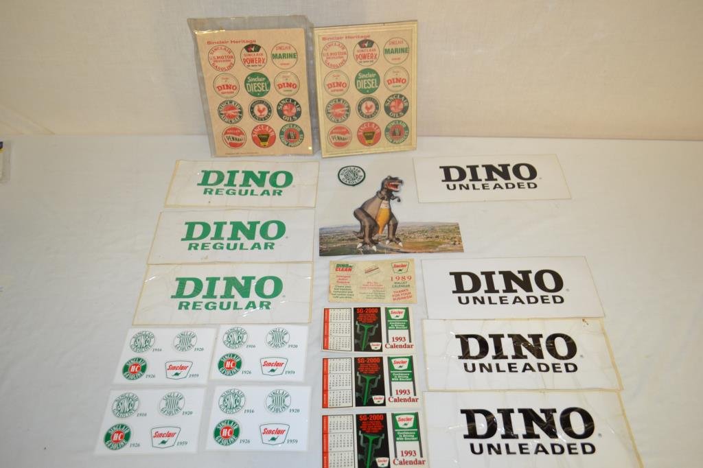 Assorted Sinclair Patch, Stickers Calendars & Misc: Sinclair SINCO Gasoline patch, 4 shees of stickers with various Sinclair logos, 3 DINO REGULAR decals, 4 DINO UNLEADED decals, 1 1989 wallet calendar, 4 1993 wallet calendars, 1 1991 lithographed Sinc