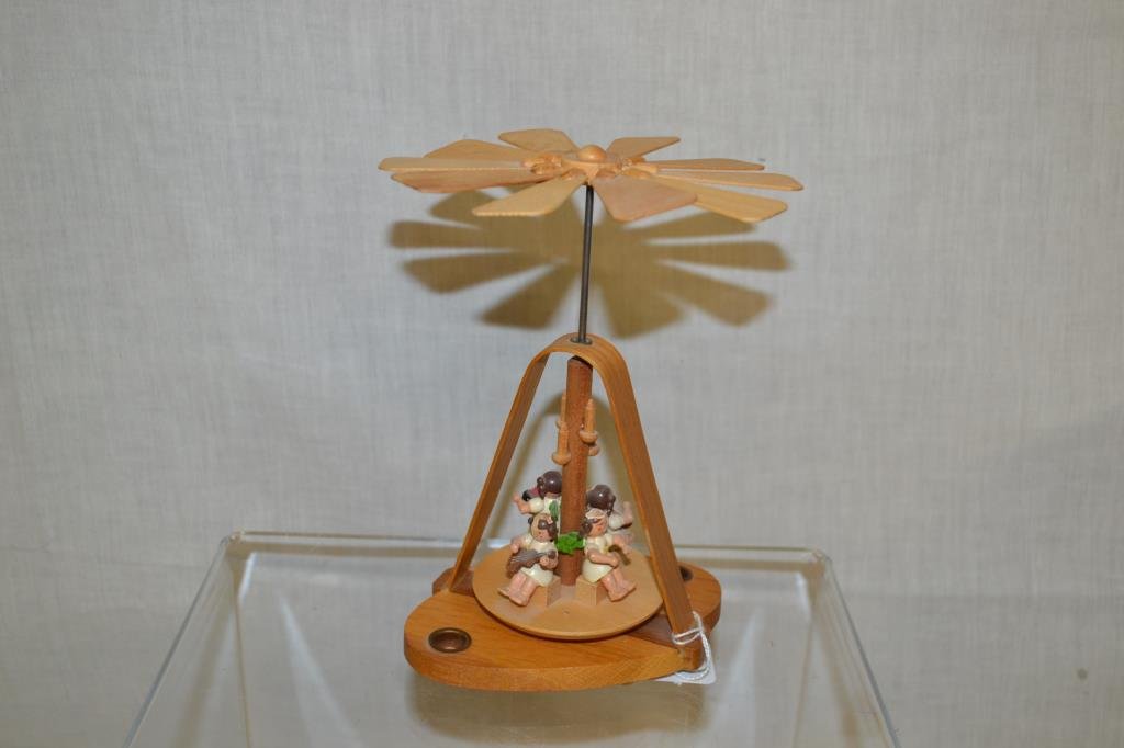 Wood Candle Powered Fan Pyramid Made in Germany: Marked on bottom Made in Germany East. 7.75" tall.