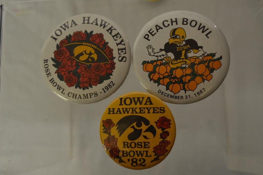 3 University of Iowa Hawkeye Football Bowl Buttons: Iowa Hawkeyes Rosebowl 82, Iowa Hawkeyes Rose Bowl Champs 1982, Peach Bowl Iowa #1 December 31, 1982.