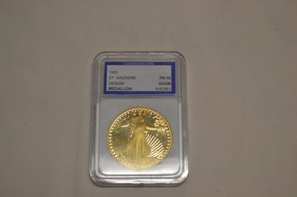 Graded 1933 St. Gaudens Medallion Copy: Graded PR-70 DCAM by International Grading Service. Coin has 10 mil .999 gold and is marked on back COPY.