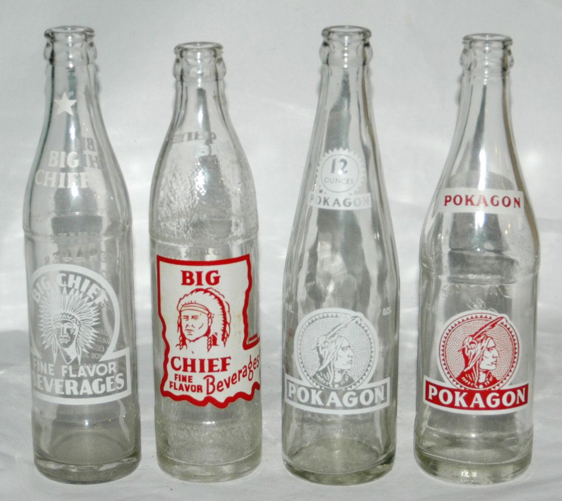 4 Vintage ACL glass Soda Bottles Native American Indian: Group of Four Vintage ACL glass soda bottles with Native American Indian Logos 1. Pokagon-Beverage-Company-ACL-glass-soda-bottle-with-Native-American-Indian-Logo White2. Big Chief ACL Glass soda bottl