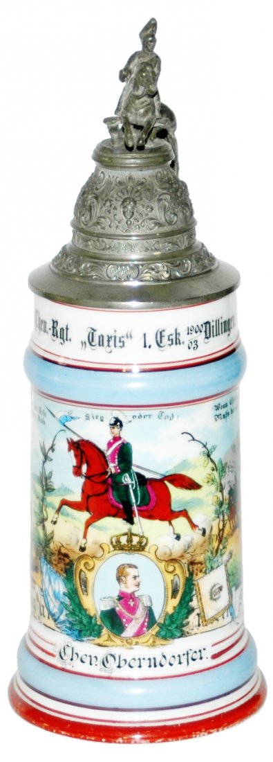 Regimental Chev Taxis 1 Dillingen Stein Saddle: Regimental Stein 1/2L Porcelain. “2. Chev. Regt. Taxis 1. Esk. Dillingen 1900-03, Two side scenes. Rear roster. Saddle thumblift.