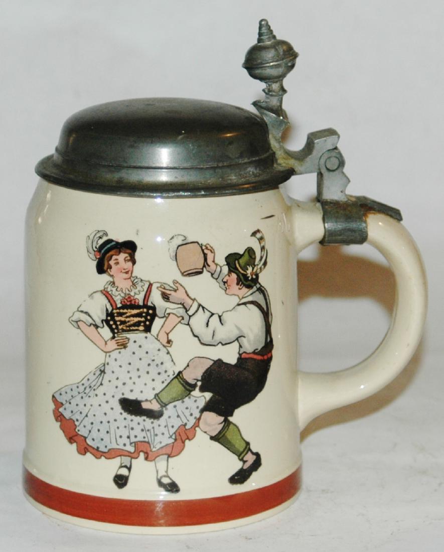 Mettlach Bavarian Couple Dancing Stein: Mettlach #1526/1280 PUG 1/2L of couple dancing in Bavarian dress. Mint