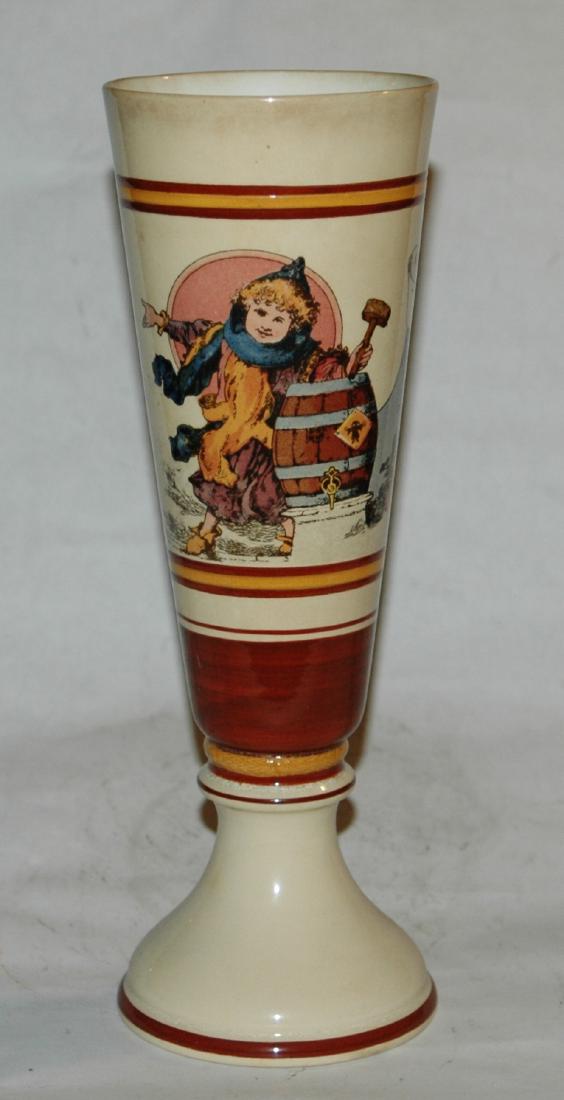Mettlach Munich Pilsner Munich Child Beaker: Mettlach #2775/1014 PUG 1/2L Pilsner Beaker. Munich Child stands by barrel. Mint