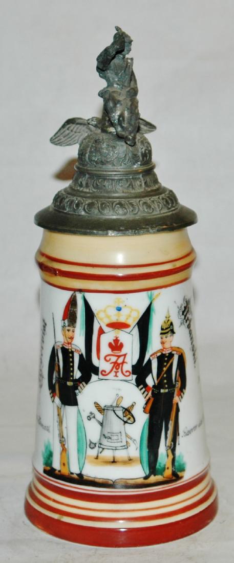 Porcelain Garde Grenaier Regimental 1/2L Stein: Regimental Stein 1/2L Porcelain. "7 Compagnie Kaiser Alexander Garde Grenadier Regiment no 1 Berlin 1900-1902, Reservist Urbanski." Two side scenes.