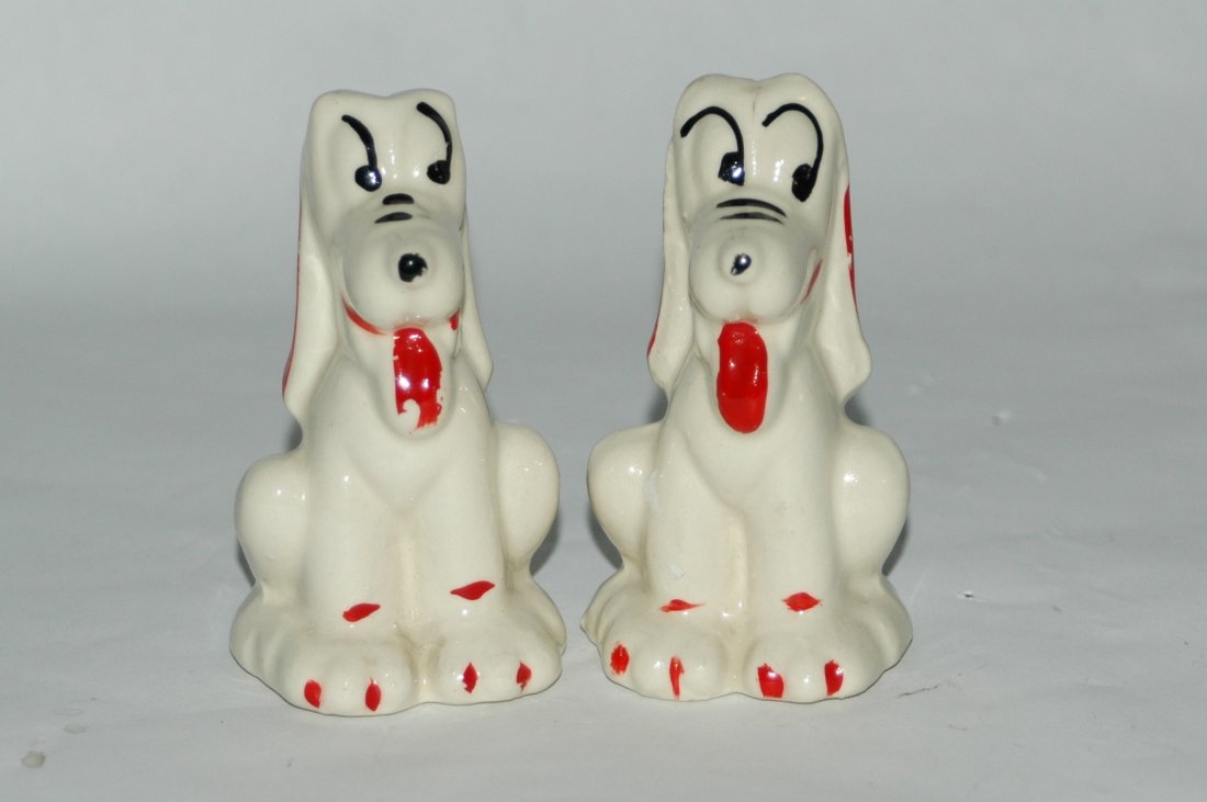 Two PAIRS of Vintage Disney Pluto Salt & Pepper Shakers: Walt Disney's Mickey Mouse's Dog Pluto pairs of Salt & Pepper shakers. One set is hand painted and the other pair is uncolored.Four shakers in total. Excellent condition.