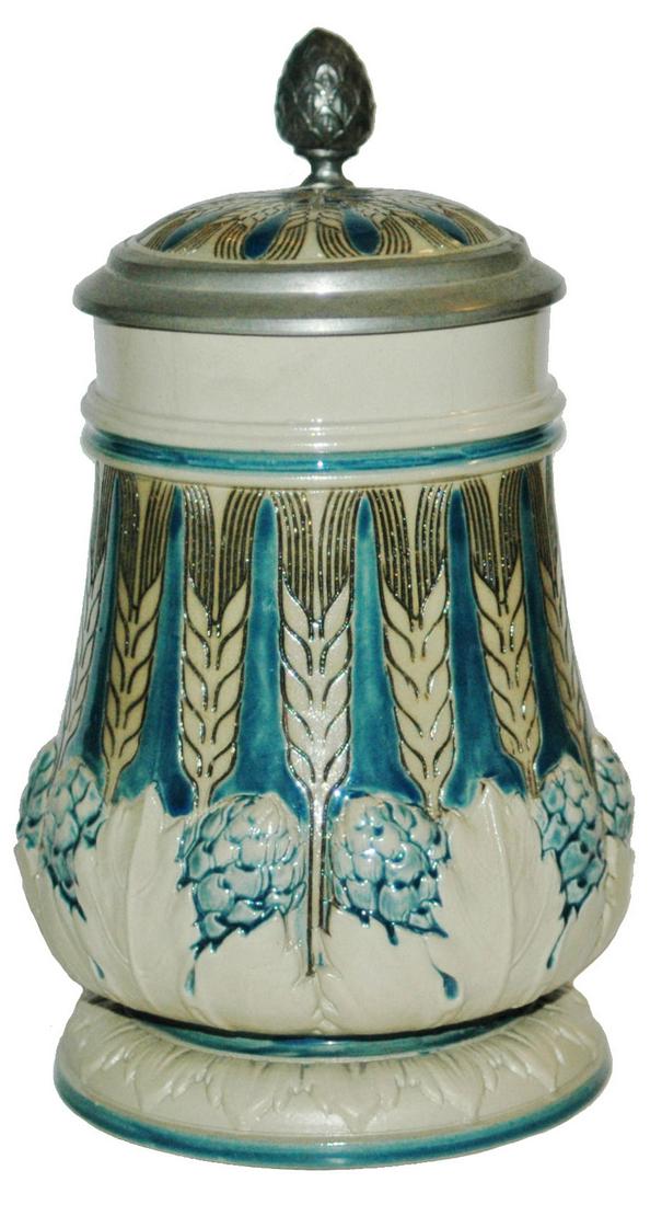 Uncommon Mettlach Mosaic Art Nouveau Floral Stein: Mettlach #2067 Mosaic 1/2L. Art Nouveau floral design. Matching inlay lid. Figural dolphin handle. Uncommon. Mint.