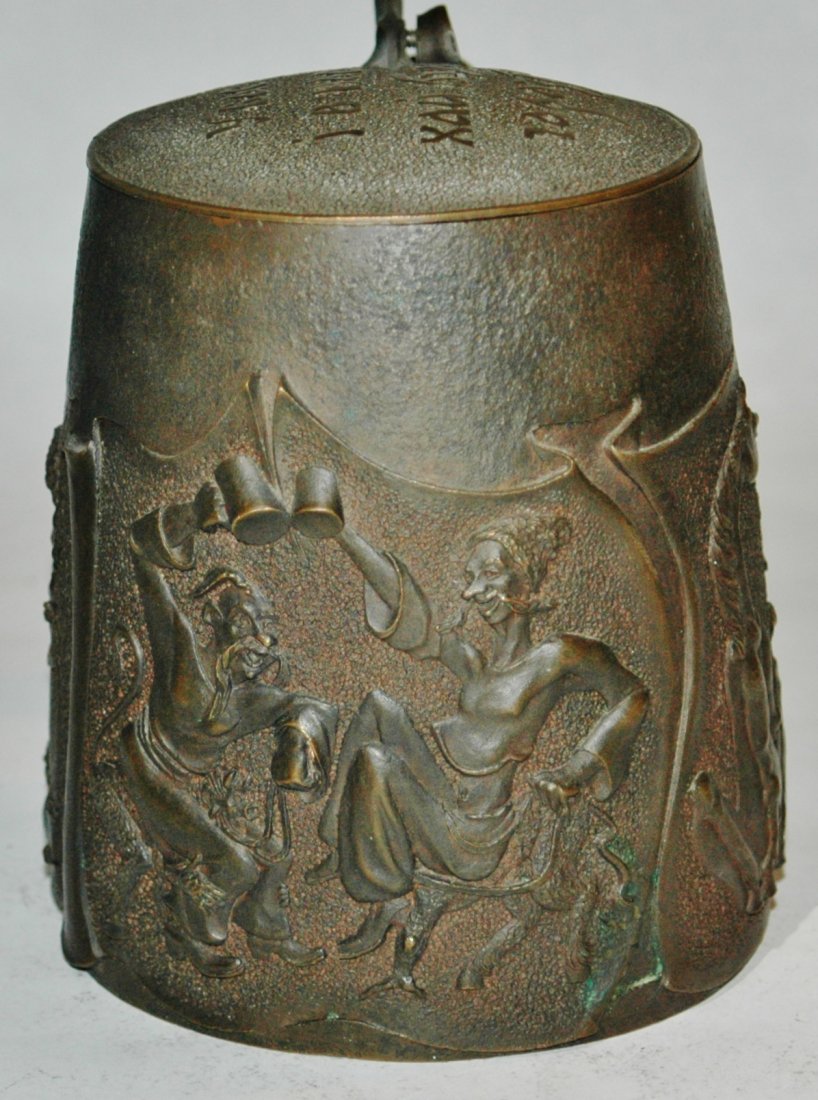Bronze relief 1L Ukraine stein: Bronze Relief 1L. Comical drinking scenes. Made in the Ukraine. Matching lid with right handed handle. Rare. Mint.