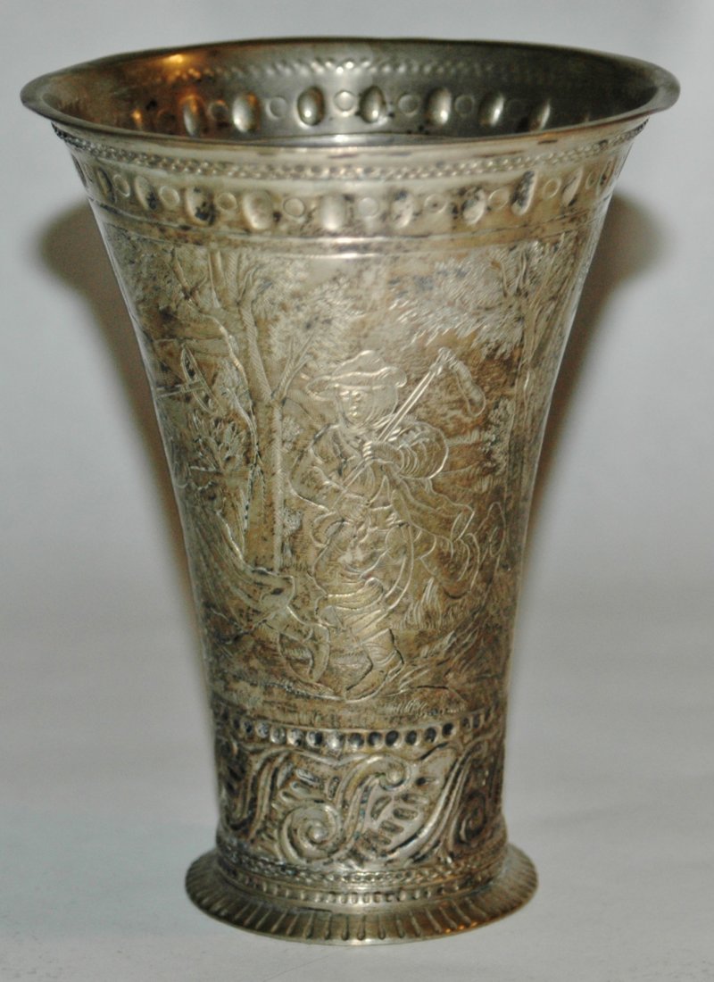 Silver engraved farming 5 1/4" beaker: Silver 5 1/4” Beaker. Engraved scene of group with farming tools working on castle landscape. Hall marks on base. Mint.