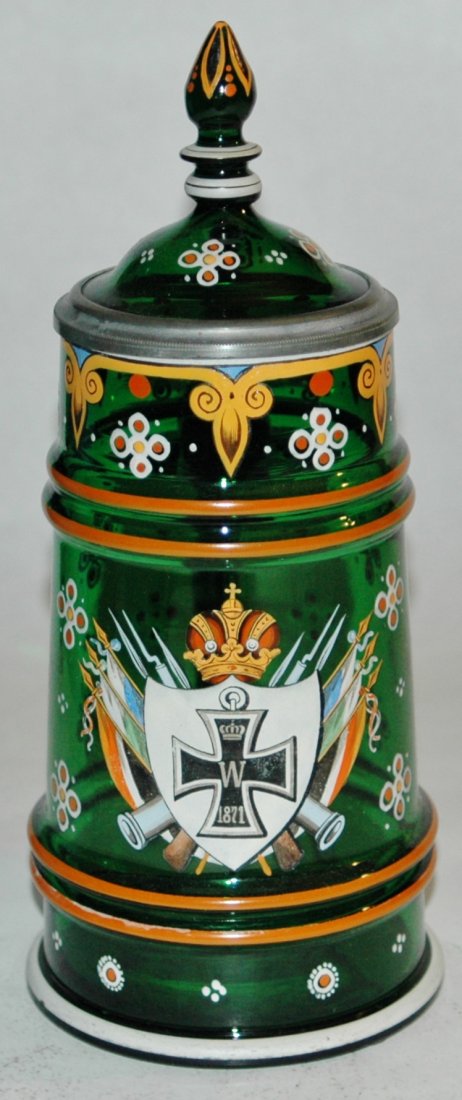 Blown Egermann Green Glass stein with iron cross: Blown Green Glass 1/2L stein. Enameled 1871 iron cross and floral. Egermann. Matching glass inlay lid with finial.
