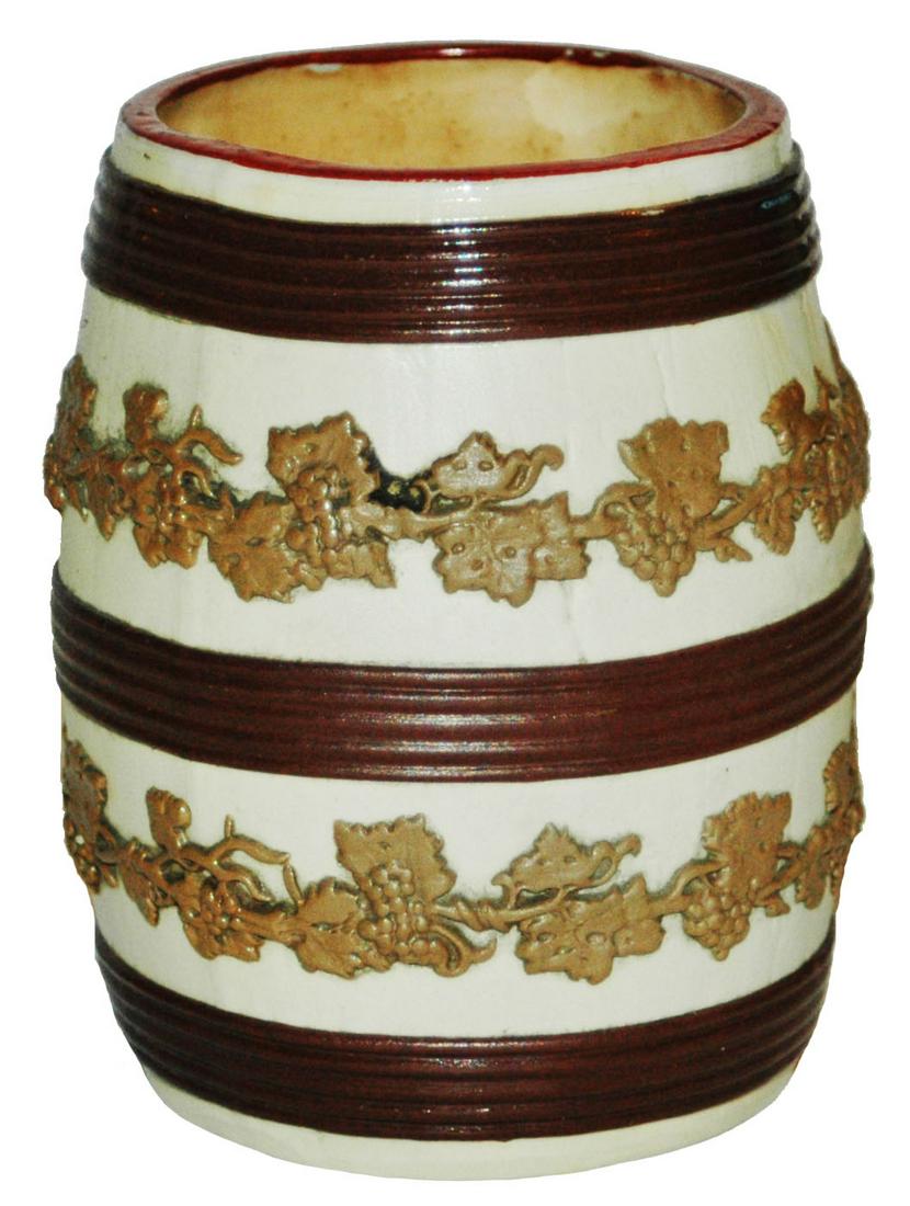 Mettlach Relief Character Barrel Beaker: Mettlach Relief Character 1/4L Beaker. Barrel shape. Interior staining, otherwise mint.