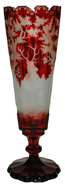 14" Intaglio Cut Stag & Forest Faceted c.1860 Vase: Blown Glass 14” Vase. Ruby stained and intaglio cut stag in forest scene on faceted body. Great detail. Bohemian circa 1860.