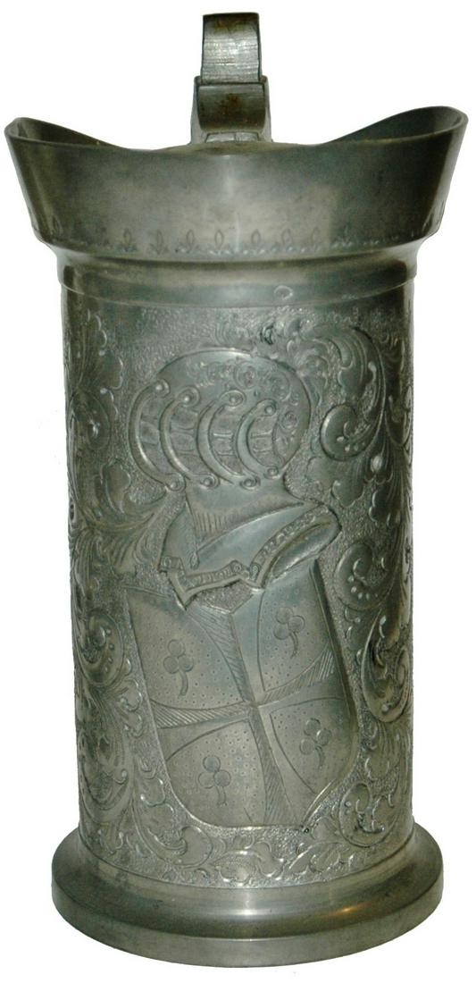 1L Hand Chased Pewter Floral Armor Stein c,1840: Pewter Flemish 1L. Hand chased floral, armour and shield. Circa 1840. Normal wear.