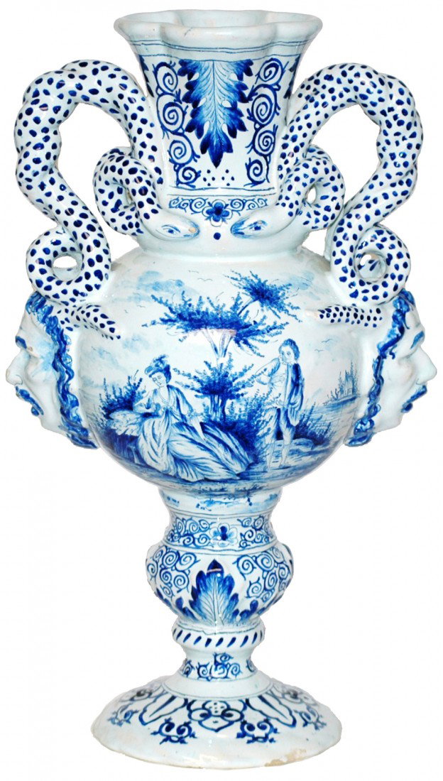 Delft Faience Two Handled Urn: Circa 1890 Blue Decoration of couple with snake handles. Two huge faces on sides.