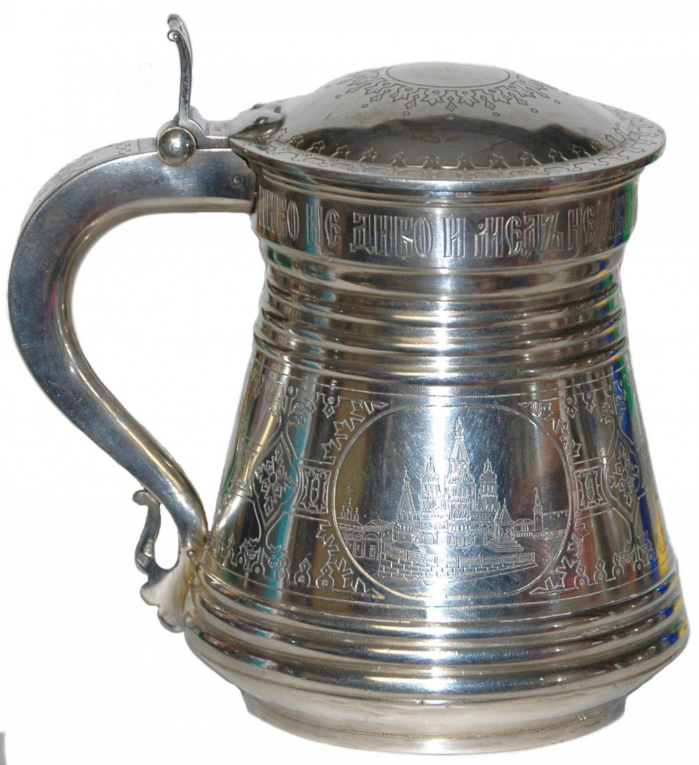 Russian Silver Tankard Kruzhka Stein: 1 L. Russian Silver tankard. Two oval panels, one of the city of Moscow, the other St. Petersburg. Russian name for tankard is Kruzha. Has Moscow city hallmarks, 84 and St. George slaying the dragon.