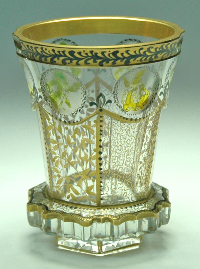 Transparent Enameled, Facet-cut and Gilded Beaker: Blown glass Beaker. 4 ½ "Transparent enamel and fancy gilded design on facet cut body.
