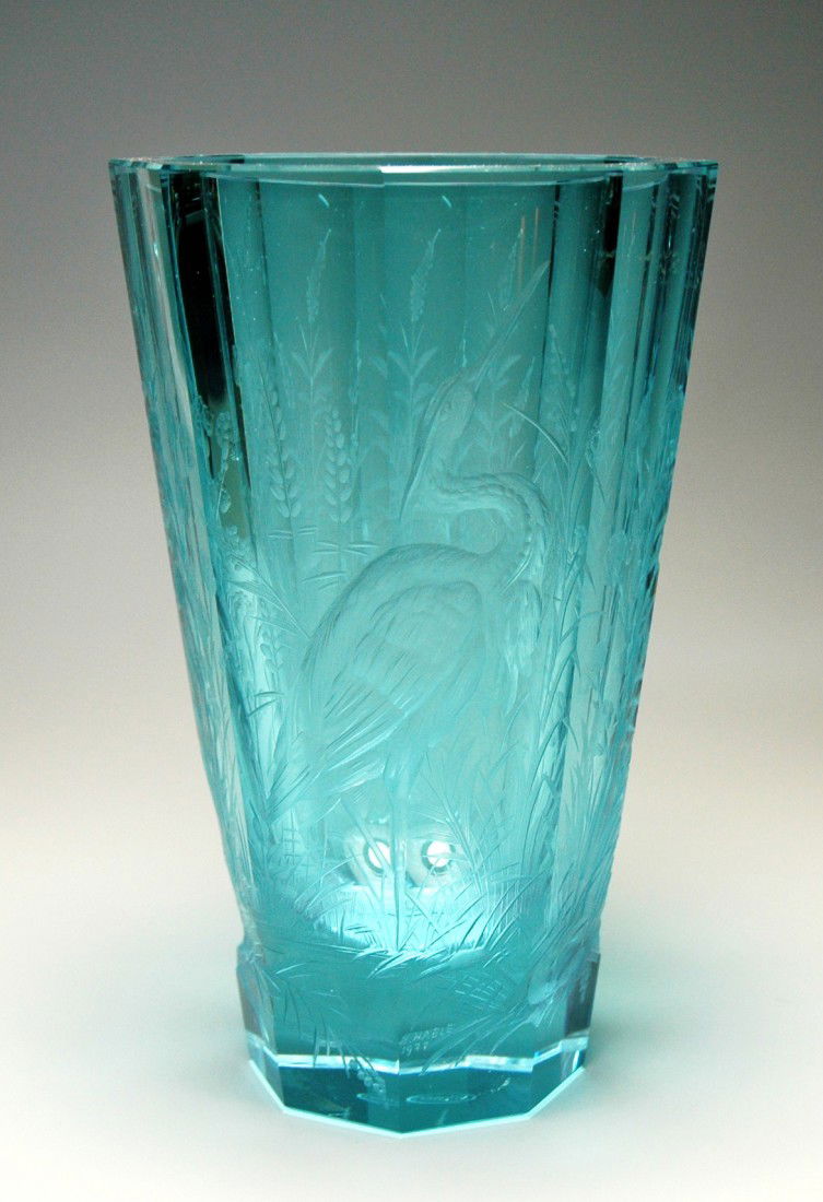 Moser Alexandrite Intaglio cut Vase: Blown Alexandrite glass vase. 9". Intaglio cut and floral. Signed 1977 Moser.