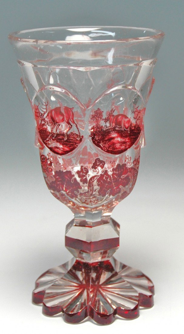 Bohemian 1860 Ruby Stag Beaker: Blown glass Beaker 6 ½ ". Ruby stained stag and floral panels on faceted body. Bohemian 1860.