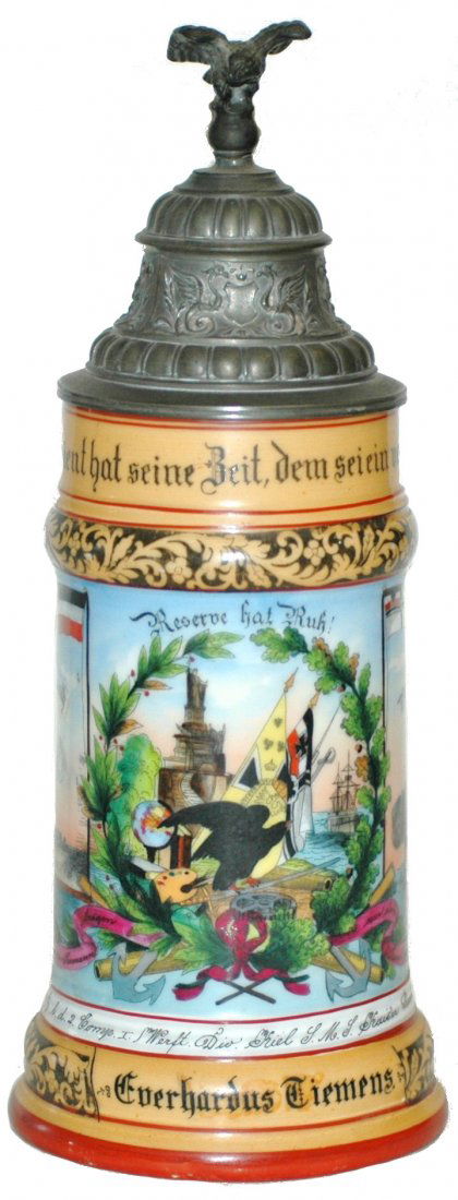 Scarce Dockyard and Two Different Ship Duty Stein: 1/2 L Porcelain Regimental. "b.d. 3. Comp. I. Werft Div. Kiel S.M.S. Kaiser Barbarossa & Kaiser Karl der Grosse, Everhardus Tiemens." Two Ship side scenes. Rear Roster. Scarce dockyard duty combined w
