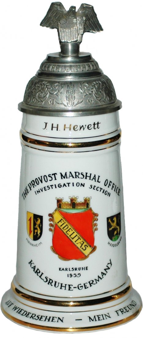 1955 Karlsruhe American Cold War Stein: American Cold War Regimental 1/2 L. Porcelain. The Provost marshall Office Investigation section. Karlsruhe, Germany 1955. Roster and crossed pistols on the sides.