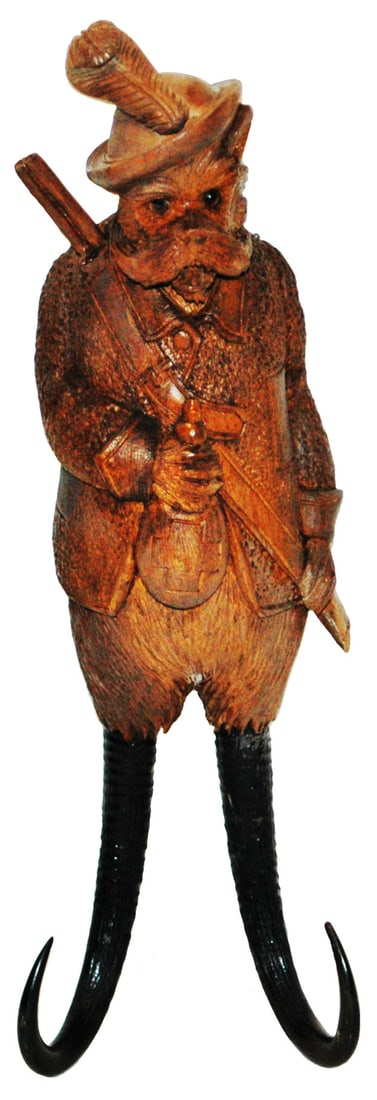 Black Forest Whip Hook Hunter Dog w Music Box: Black Forest Carved Wood 13” Whip Hook. Dog dressed as hunter with rifle and bag. Music box in hanging rear.