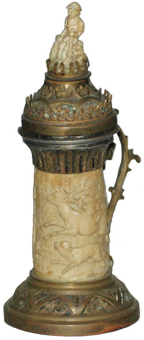 Carved Ivory Stein. Hunting dogs & Stags. Brass: Carved Ivory. 5-1/2" Tall Stein. Hunting dogs chase stag. Figural hunter & dog finial lid. Brass mounts. Mint