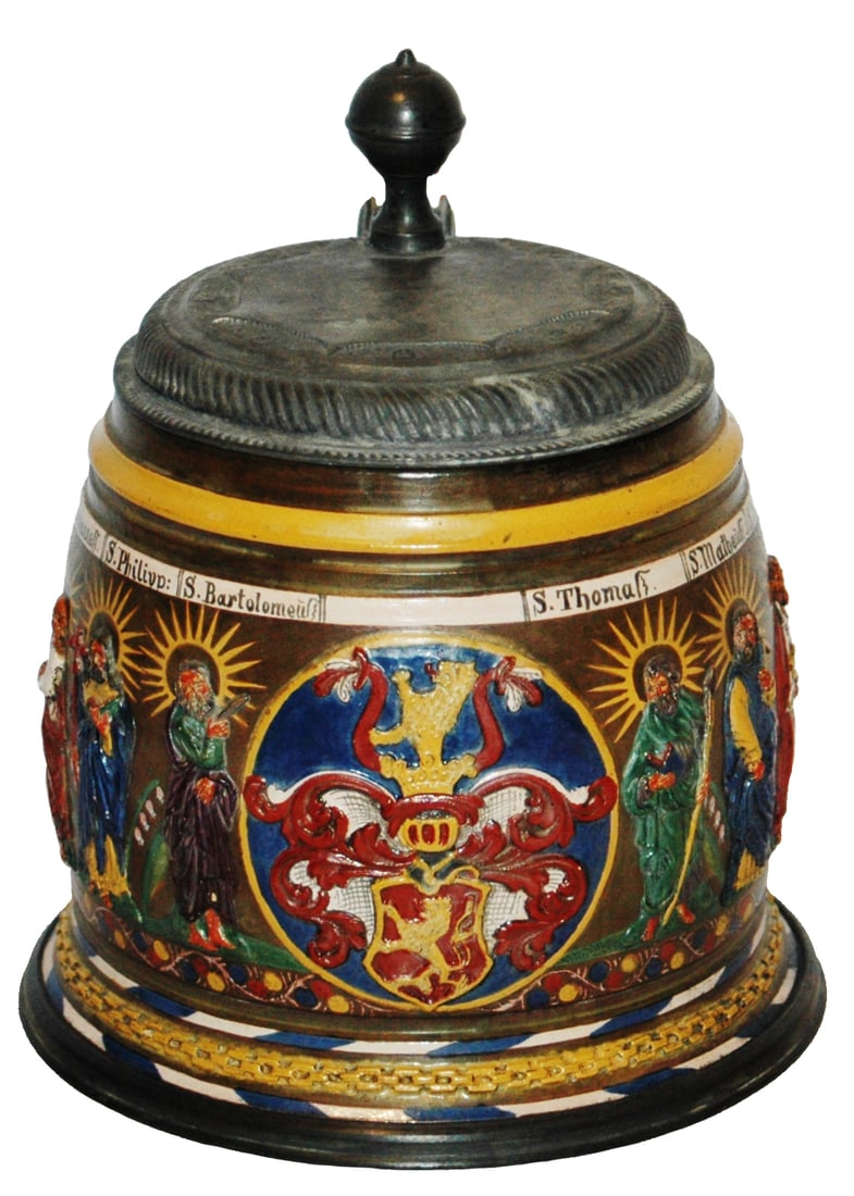 1-1/4L Heraldic Shield & 12 Apostles Relief Stein: Pottery Relief 1 1/4L. Kreussen style. Heraldic shield and twelve apostles. Very good condition.