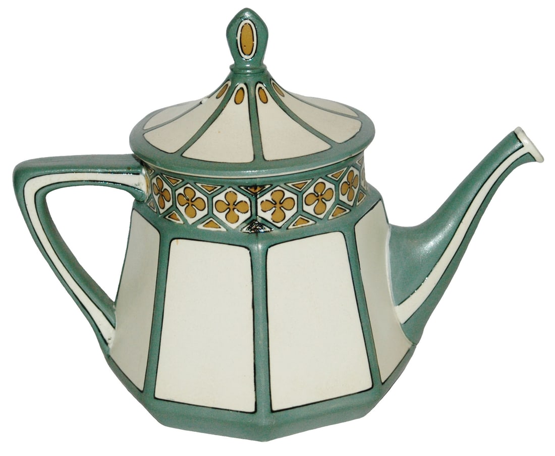 Mettlach Etched Art Nouveau Tea Pot w Set on Lid: Mettlach Etched Tea Pot. Art Nouveau dinnerware set. Set on lid.