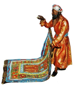 Vienna Bronze Standing Arab holding a rug Figure