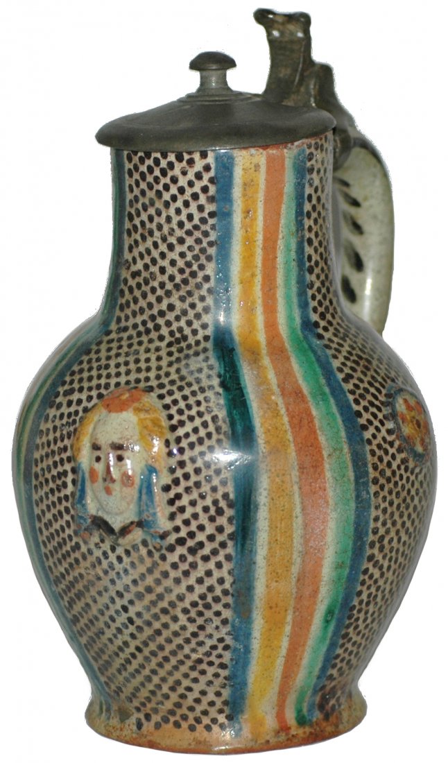 Rare C.1600 Hafnerware Winterthur Stein: Hafnerware 1/2L. Winterthur, Swiss. Raised face with dot and line design. Circa 1600. Very good condition. Rare. Bob Alutin collection.