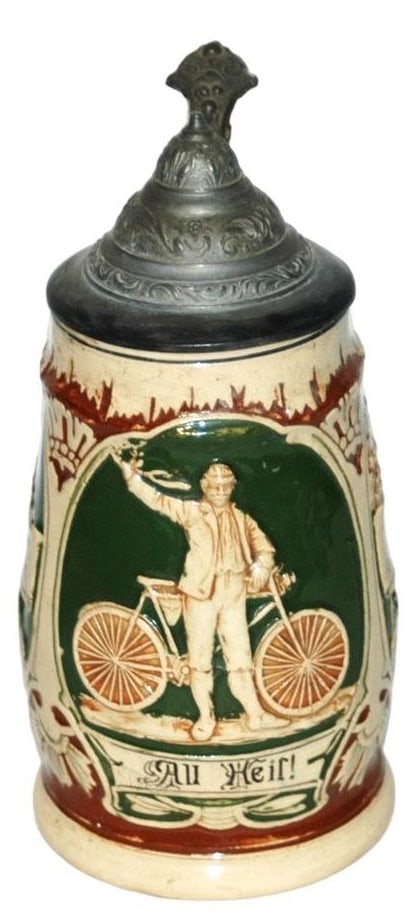 Man w Early Bicycle Stein w Castles on Sides (1 of 4)