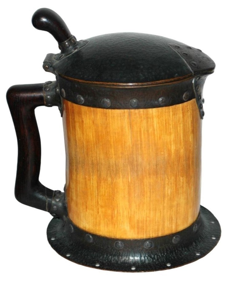 Unique Iv ory 2L Stein Arts & Crafts Style w Brass: Ivo ry Tusk 2L Stein 11 1/4". "Carved Bone" Arts & Crafts style hammered brass lid, top rim and base. Very good condition and unique.