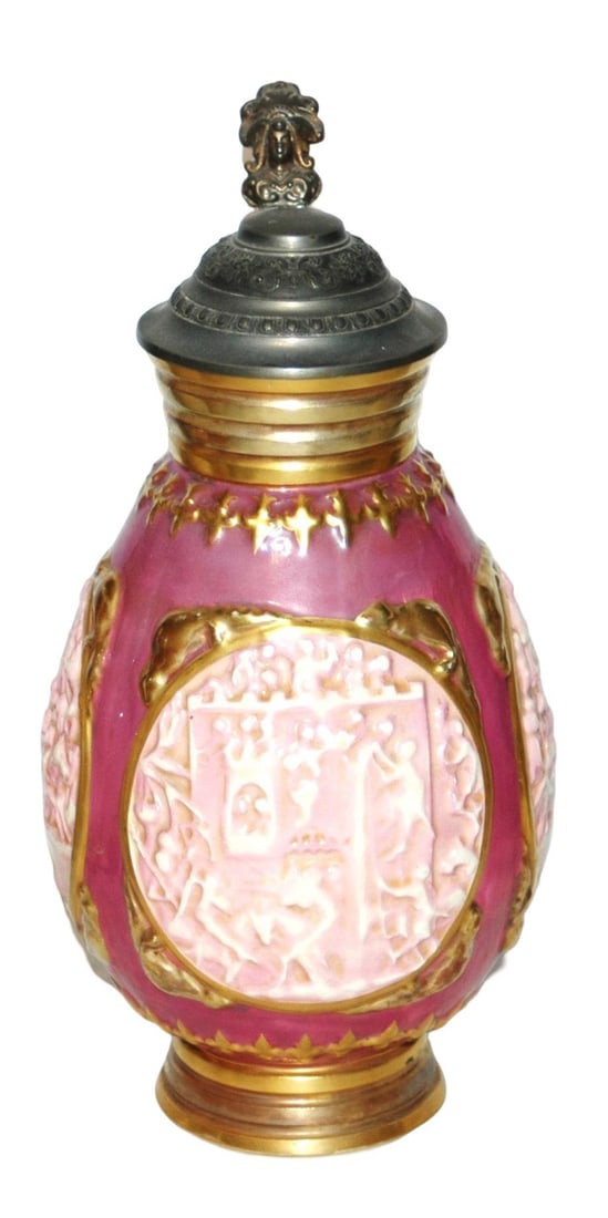 Uncommon 1-1/4L People Storming a Castle Stein: Zsolnay Glazed Relief 1 1/4L. Three panels of people storming a castle. Uncommon.