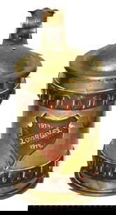 Trench Art Artillery Shell Stein w Front Shield: Trench Art 1/2L Artillery Shell Stein. Shield on front “1914-1917 Lorgies.” Small hole in center of the lid. Normal wear.