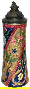 2L Majolica Fischer Zsolnay Colorful Floral Stein: Majolica Glazed Fischer Zsolnay 2L 14 1/2”. Vibrant floral in contrasting colors.