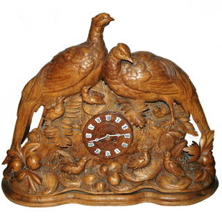 Black Forest Carved Mantel Clock w Birds & Plants: Black Forest Carved 27&#8221; by 22&#8221; Mantel Clock. Two pheasants, baby chicks and vegetation. Porcelain clock numbers. Very Good condition.