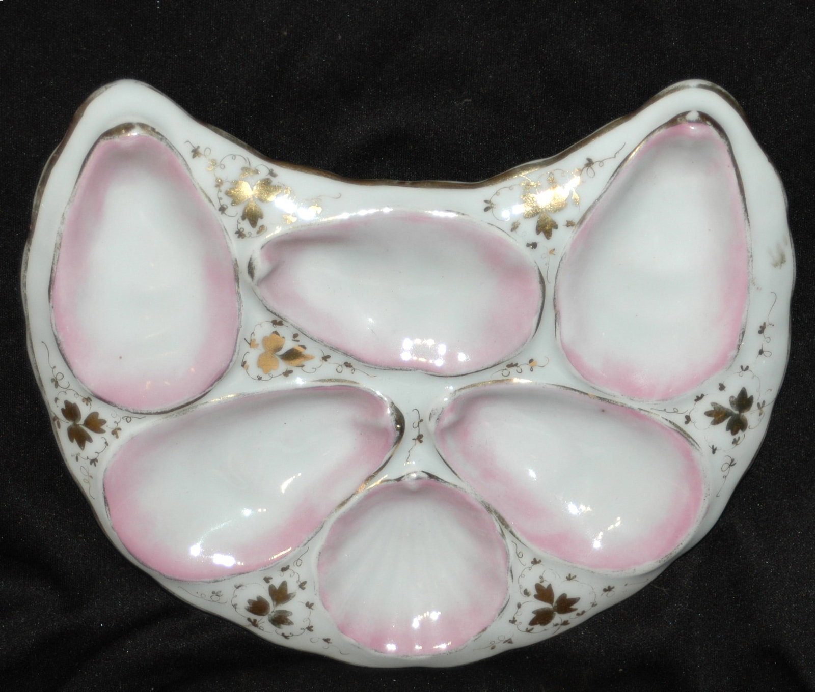 J S Lemoge Crescent Shape Oyster Plate: J S Lemoge 9" Crescent Shaped Oyster Plate. Gilded floral design on 6 wells. Mint.