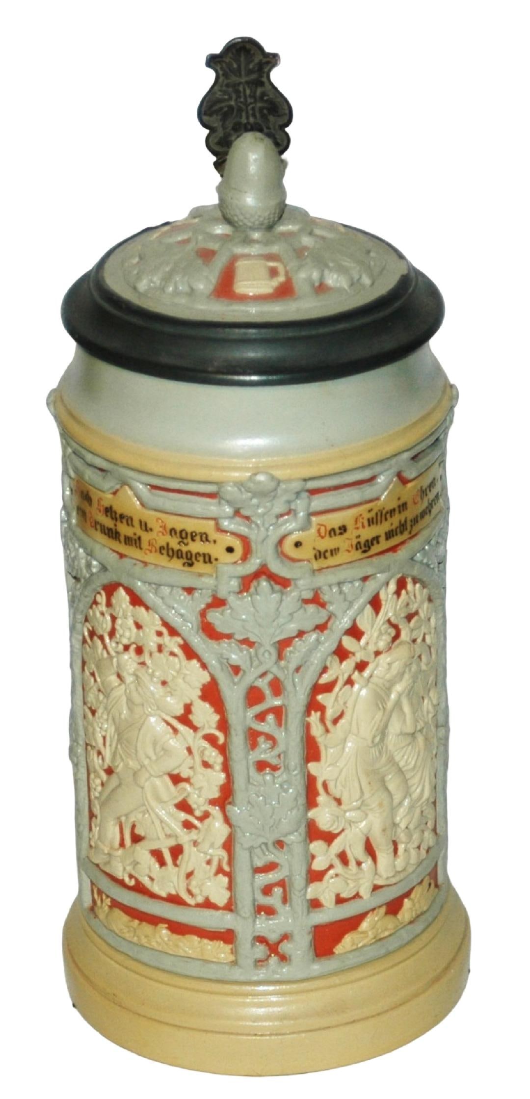 1L Mettlach 4 Detailed Relief Panels Stein: Mettlach #24 Relief 1L. Four detailed panels of men and couple. Inlay lid with acorn finial. Mint. l M
